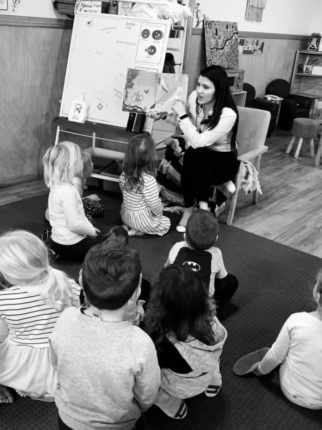 Eleni's reading to the kindergarten children at Goodstart Toowoomba - Glenvale Road